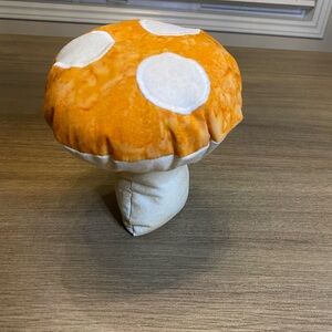 Orange and Beige decorative fabric mushroom pillow. Handmade.
